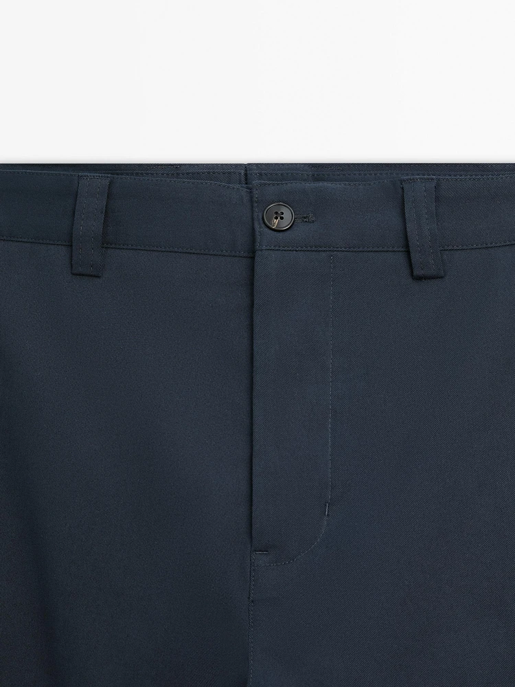 Slim fit cotton blend trousers.