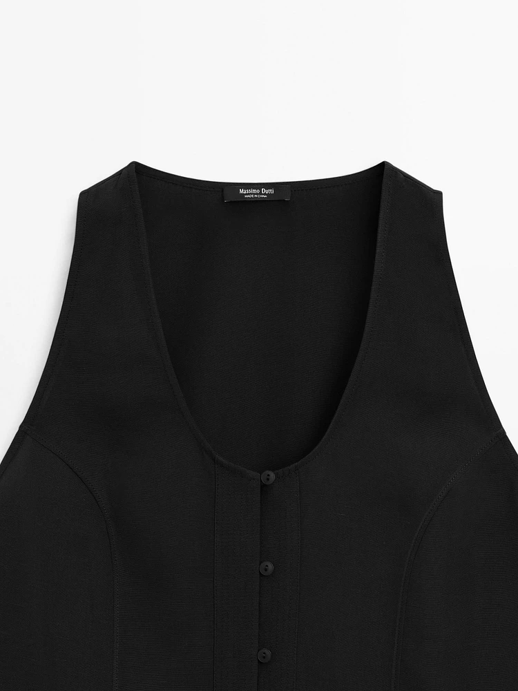 Top boutonné surpiqûre et plastron