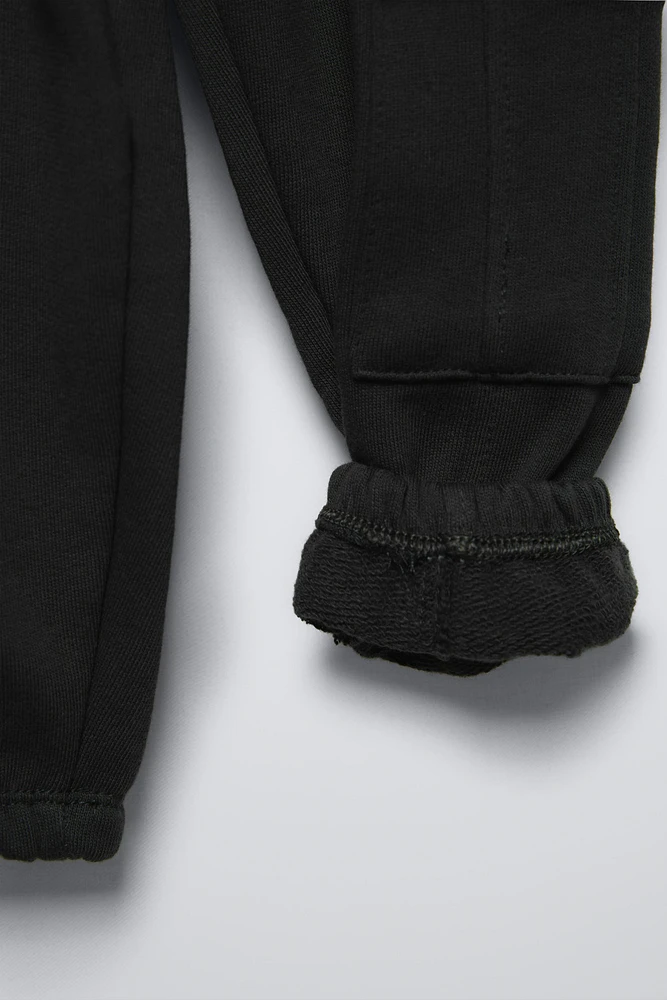 PANTALON EN MOLLETON STYLE JOGGING