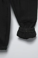 PANTALON EN MOLLETON STYLE JOGGING