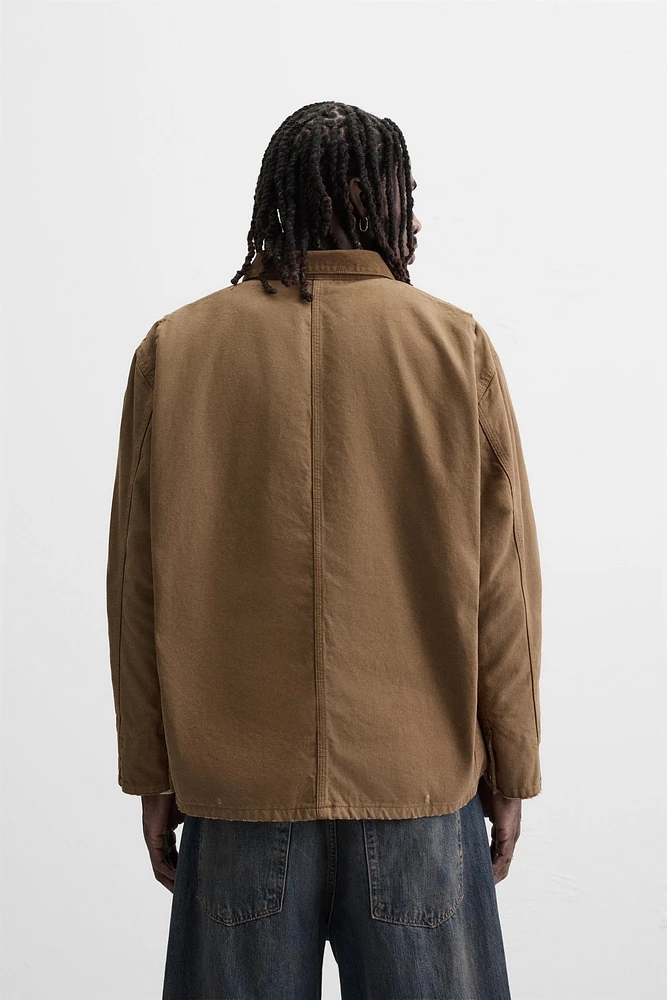 VESTE DÉLAVÉE AVEC COL EN CONTRASTE
