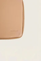 TROUSSE EN CUIR