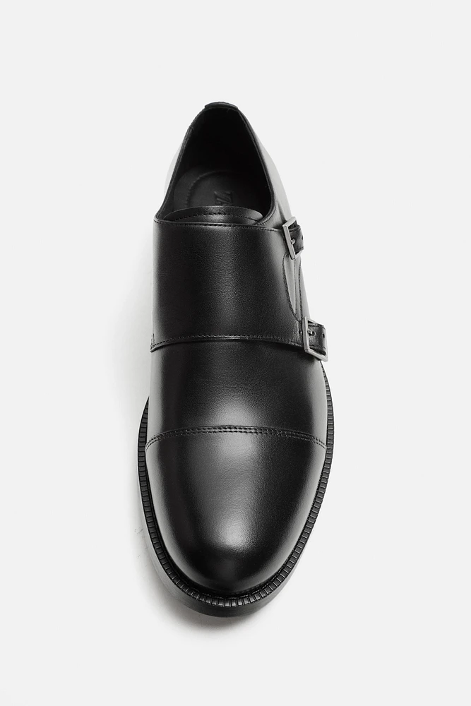 CHAUSSURES EN CUIR À BOUCLE