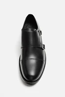 CHAUSSURES EN CUIR À BOUCLE