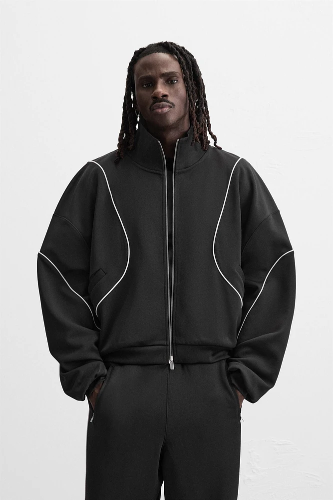 VESTE TECHNIQUE CONTRASTÉE