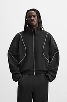 VESTE TECHNIQUE CONTRASTÉE