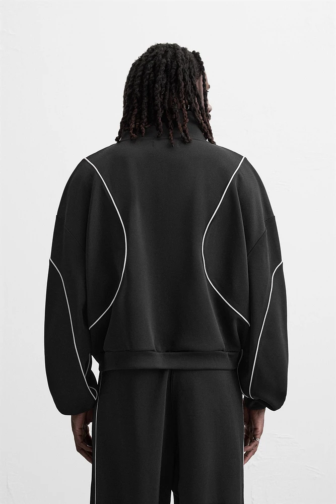 VESTE TECHNIQUE CONTRASTÉE
