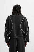 VESTE TECHNIQUE CONTRASTÉE