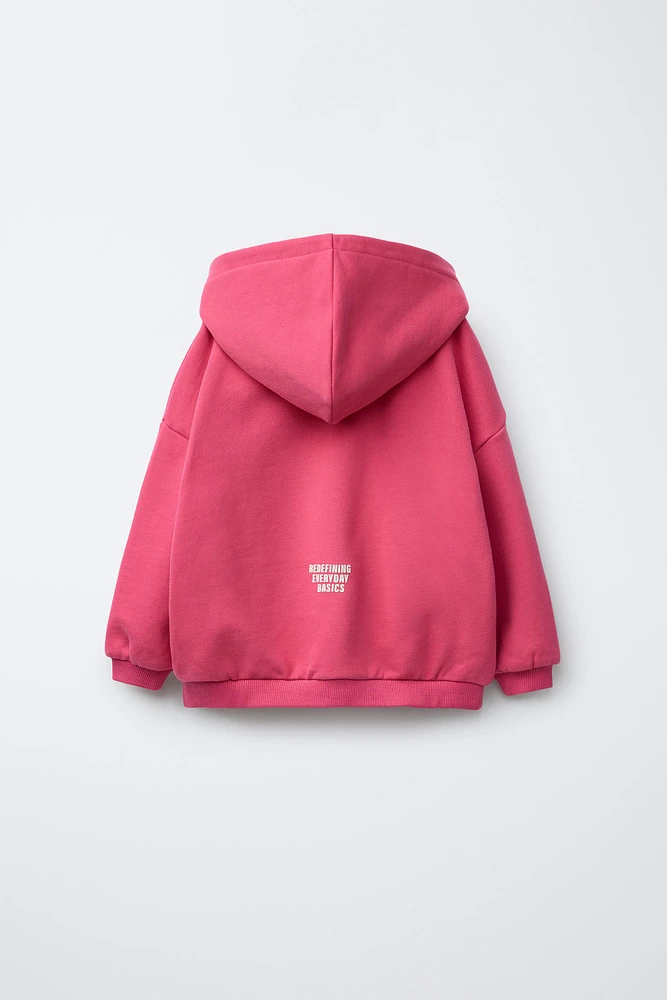 SWEAT À CAPUCHE ET LOGO
