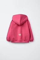 SWEAT À CAPUCHE ET LOGO