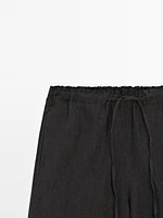 Linen suit trousers with frayed detail