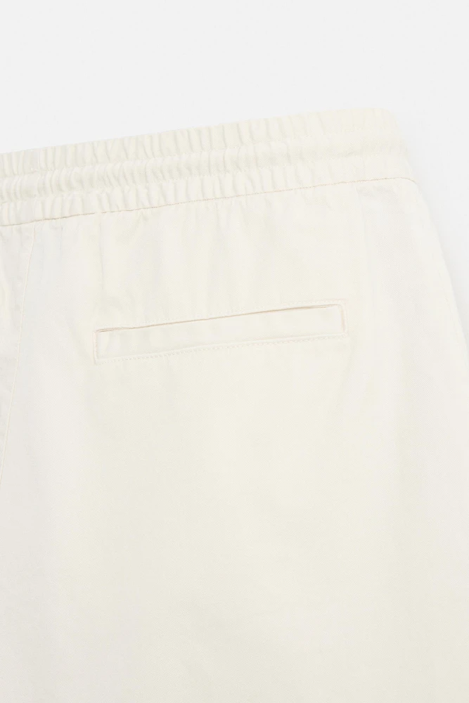 BERMUDA RELAXED FIT DÉLAVÉ