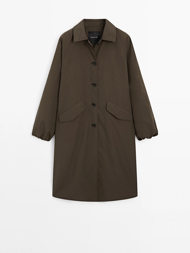 Technical fabric trench coat with button detail
