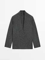 Pull en maille perlée à col effiloché