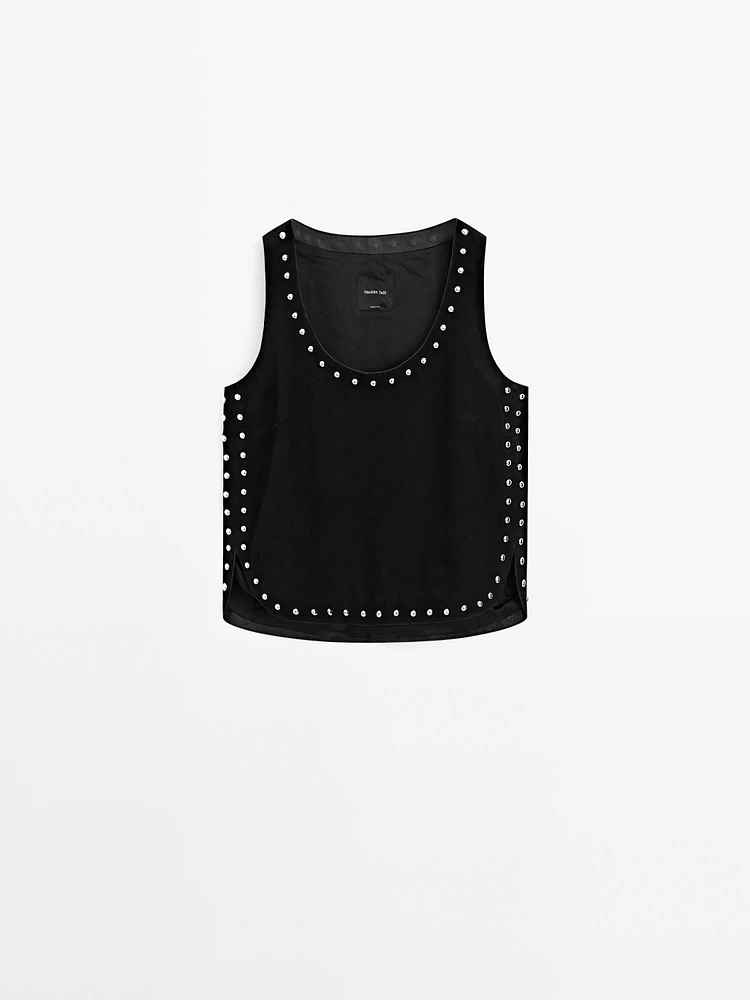 Top en cuir et daim à clous