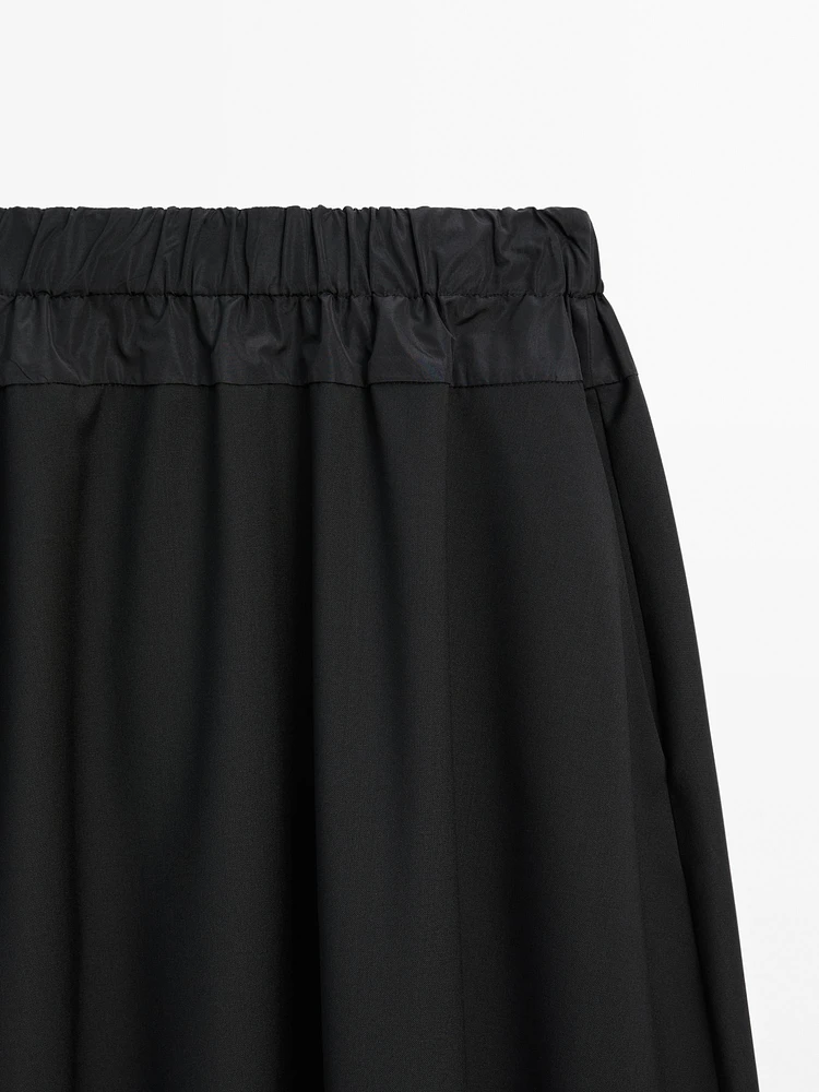 Technical fabric skirt with wool