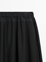 Technical fabric skirt with wool