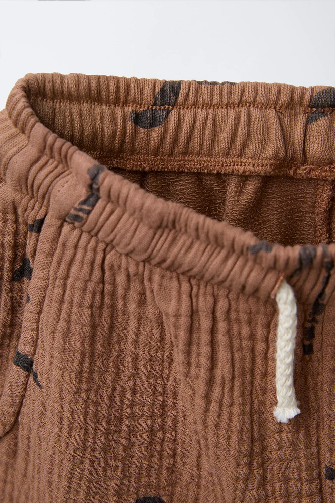 TEXTURED PALM TREE SHORTS
