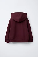 SWEAT À CAPUCHE ET ZIP