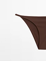 Bas de bikini fine lanière