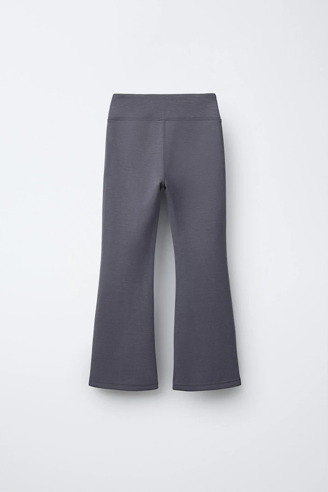 BUTTONED FLARED LEGGINGS