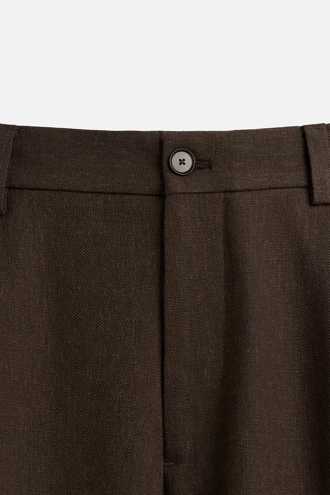 TEXTURED PLEATED SHORTS