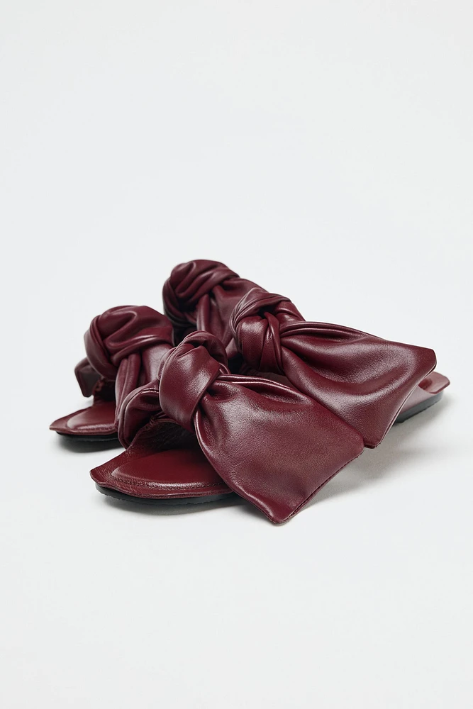 LEATHER BOW SANDALS