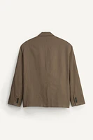 VESTE BOXY FIT COSTUME ÉDITION LIMITÉE