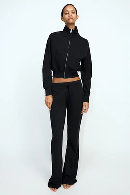 PANTALON EN MOLLETON ÉVASÉ
