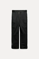 PANTALON STYLE MILITAIRE AVEC TISSU RÉSISTANT À L'EAU
 ET COUPE-VENT TECHNOLOGIE RECCO® COLLECTION SKI