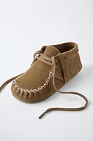 BOTTES EN CUIR À FRANGES