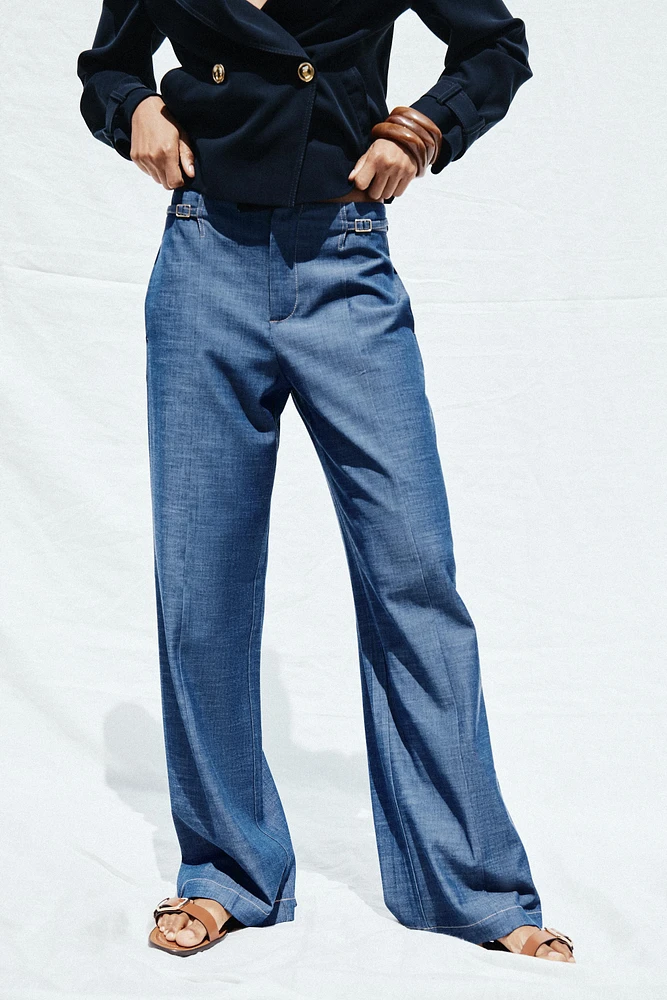 PANTALON LARGE À PASSANTS