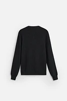 PULL EN MAILLE PERLÉE À BOUTONS