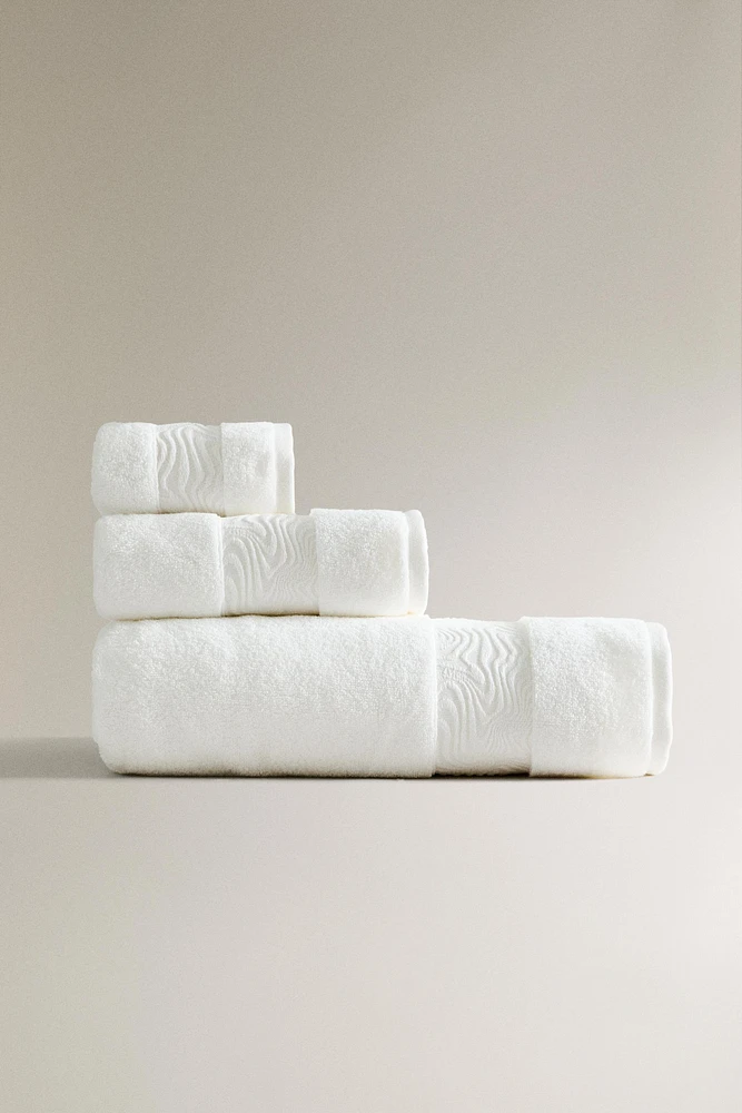 BATH TOWEL WITH MARBLE BORDER