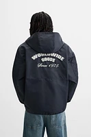 BLOUSON TECHNIQUE À CAPUCHE