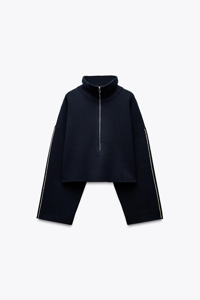 SWEAT COURT EN MAILLE AVEC LISERÉS