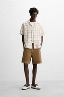 CHEMISE AVEC STRUCTURE À CARREAUX