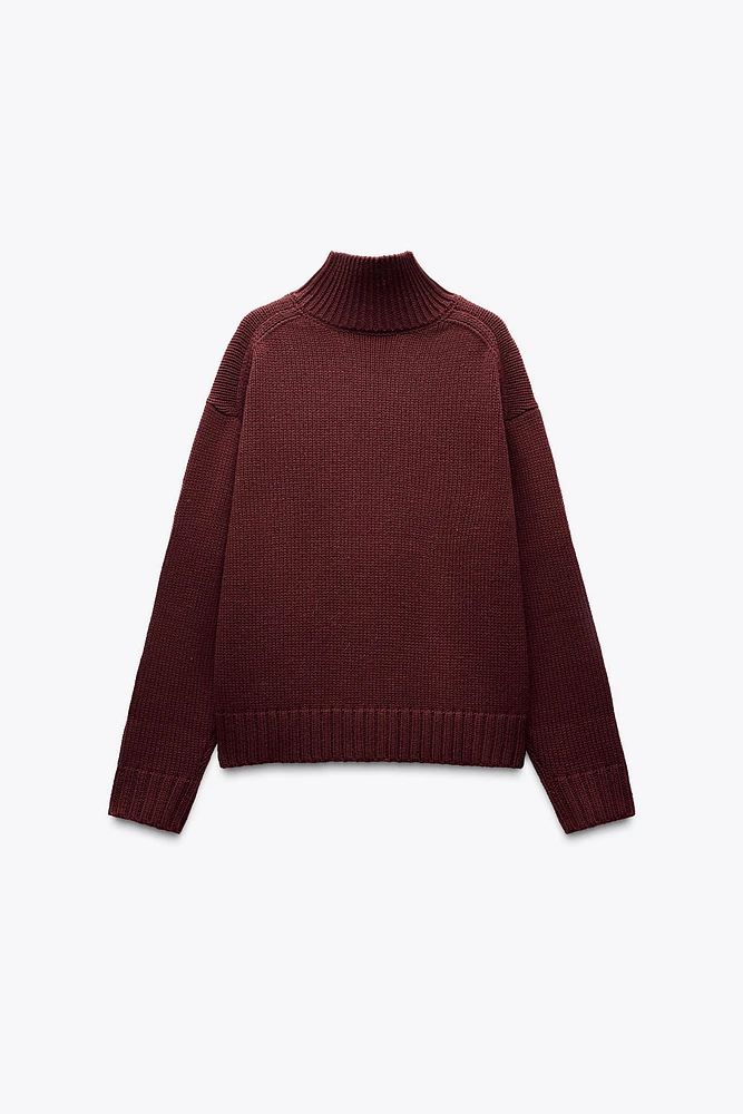 PULL EN MAILLE À COL MONTANT