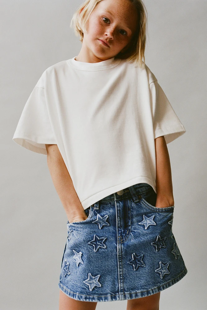 JUPE-SHORT EN JEAN À ÉTOILES