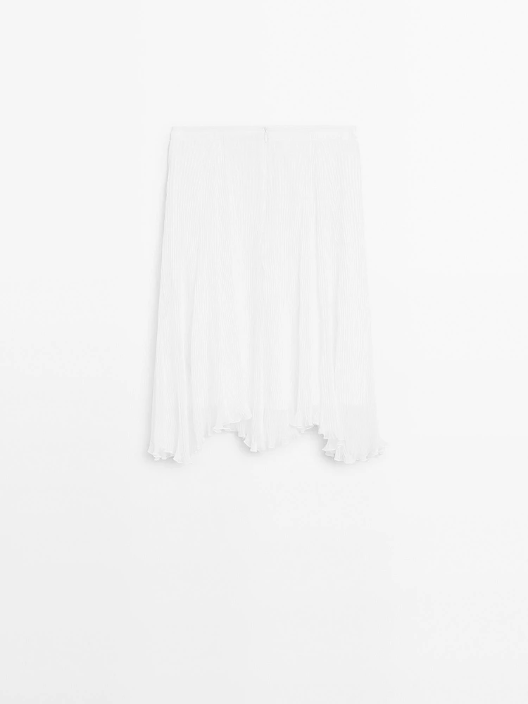 Pleated skirt with godet detail