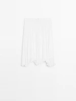 Pleated skirt with godet detail