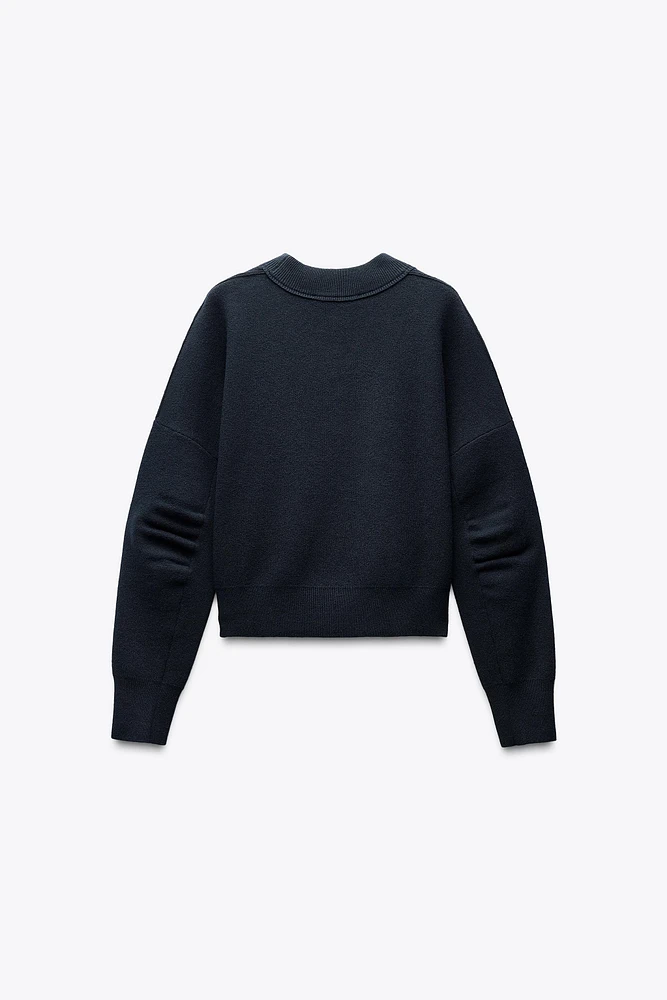 PLEATED SLEEVE SWEATSHIRT