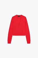 GILET EN MAILLE À LISERÉS LATÉRAUX