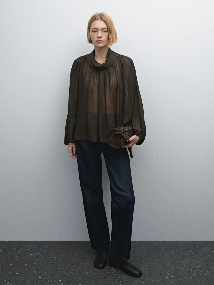 Voluminous flowing blouse with button details