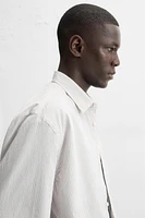 CHEMISE À CARREAUX AVEC POCHE