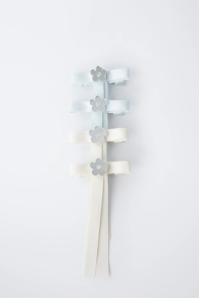 LOT DE QUATRE PINCES CLIP LACET FLEUR