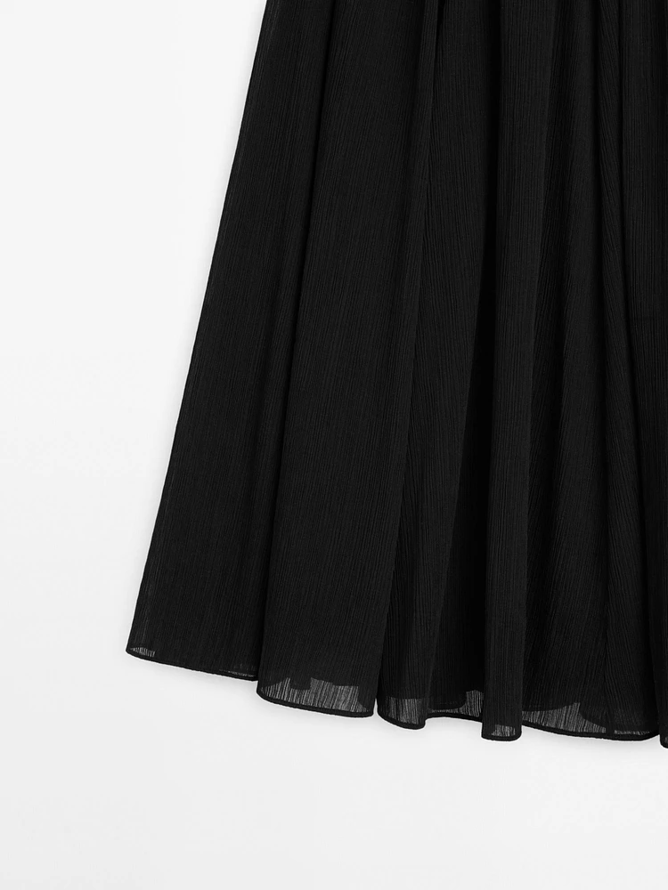 Jupe midi plissée volume