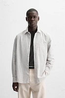 CHEMISE À CARREAUX AVEC POCHE