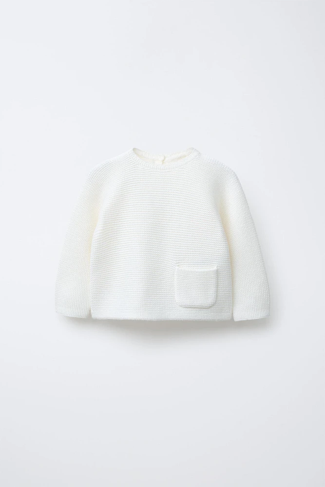 PULL EN MAILLE AVEC POCHE