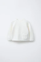 PULL EN MAILLE AVEC POCHE